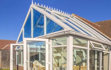 conservatory roof insulation costs Langley Corner